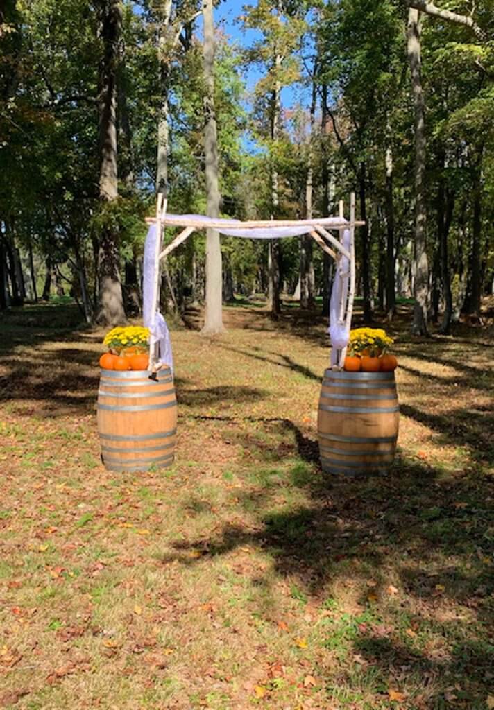 Wedding arch with wine barrels